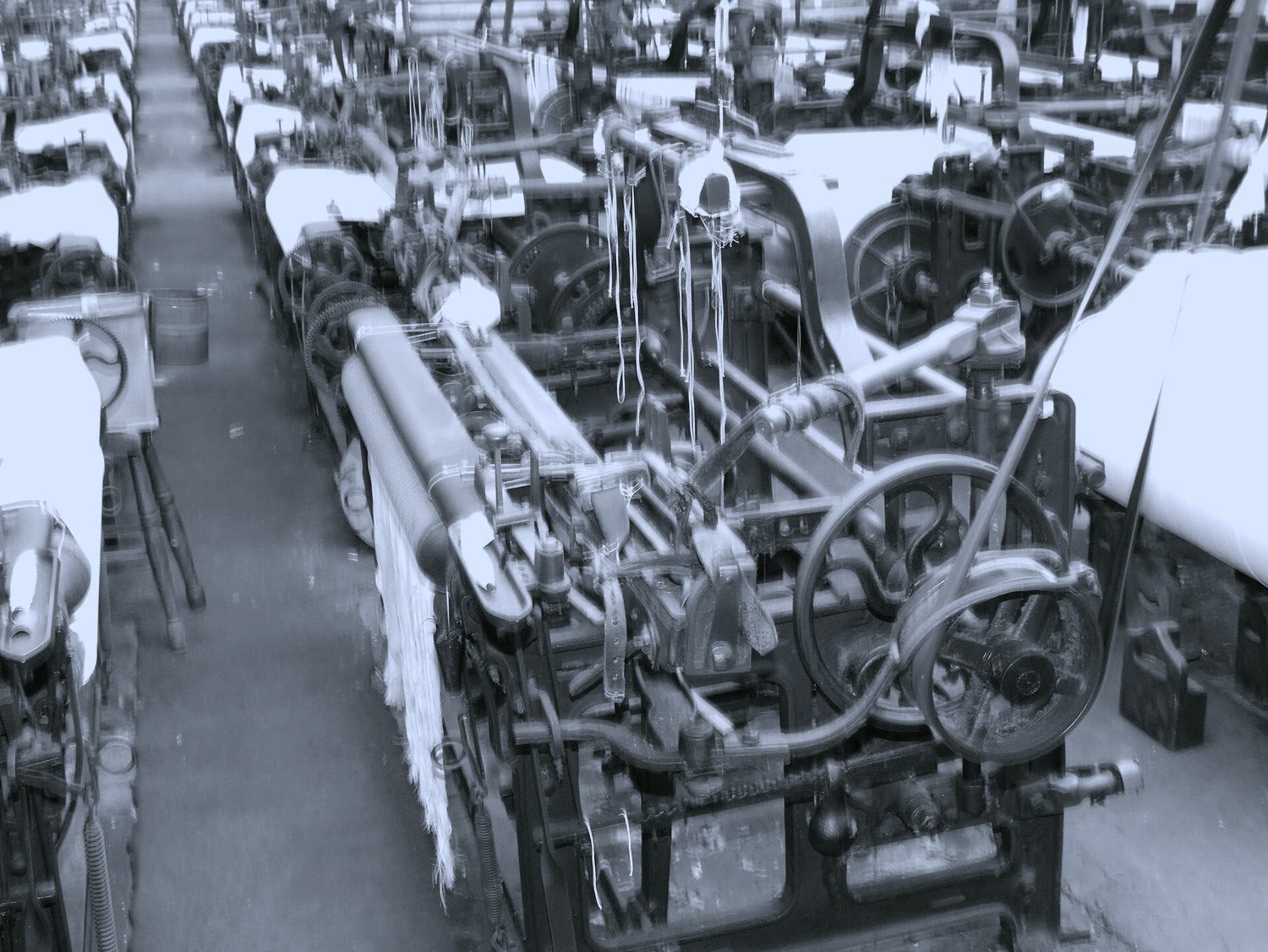 Rows of looms in a textile mill
